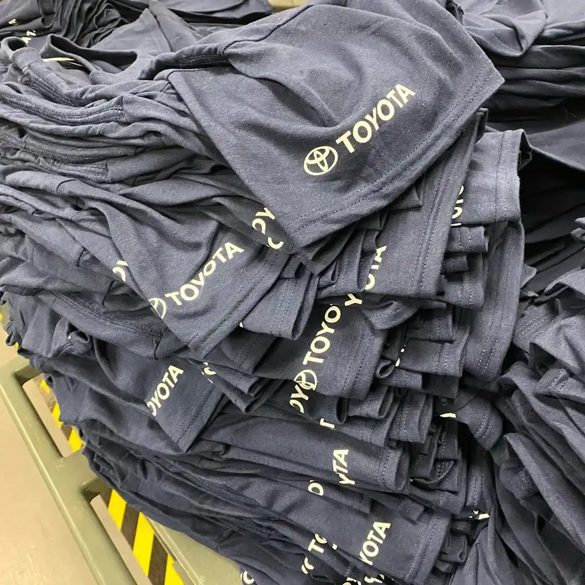 Bulk workwear t-shirt order with company logos — workwear printing Orpington